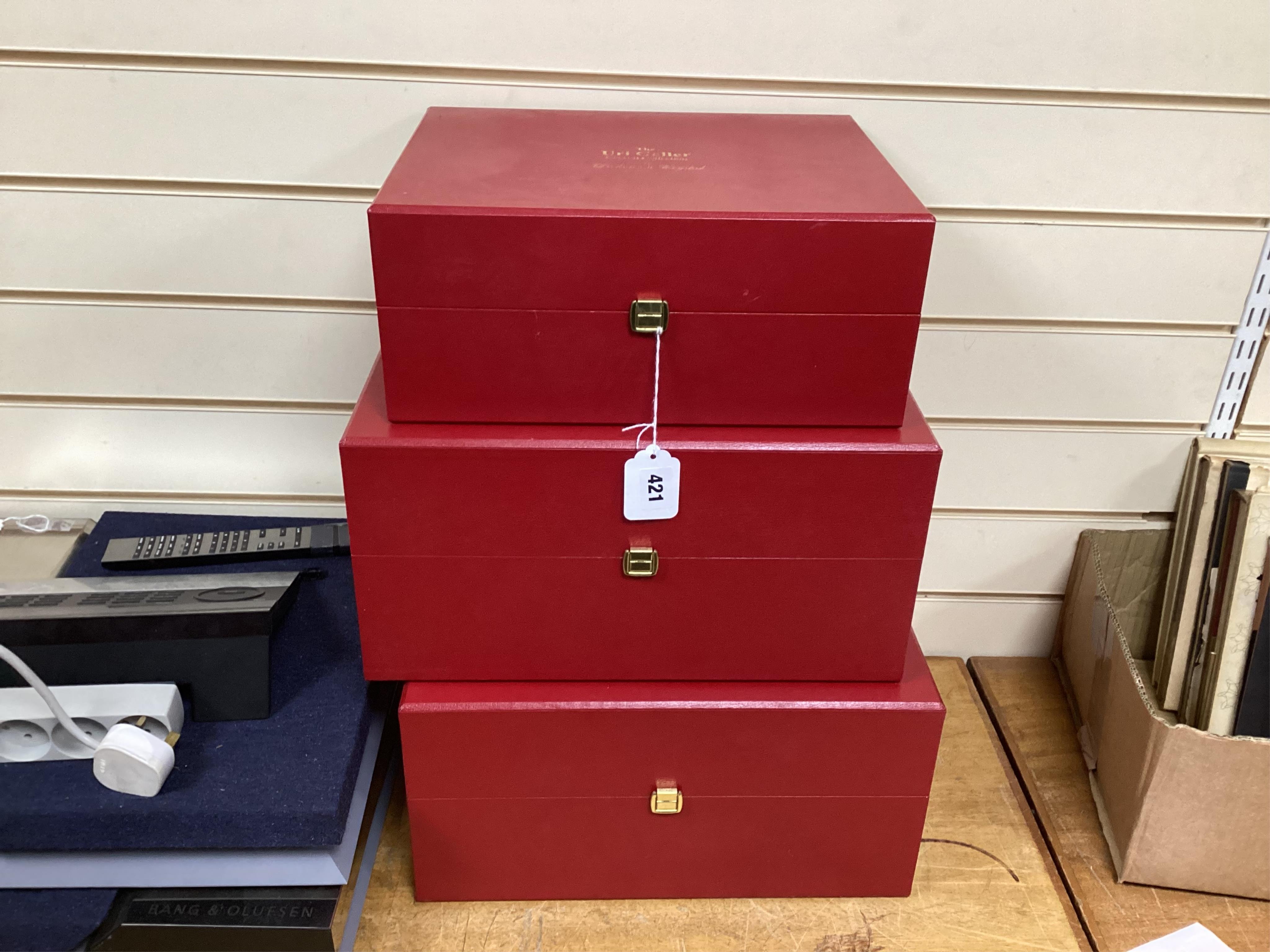 The Uri Geller Crystal Collection - three red cased sets by Dickenson Crystal